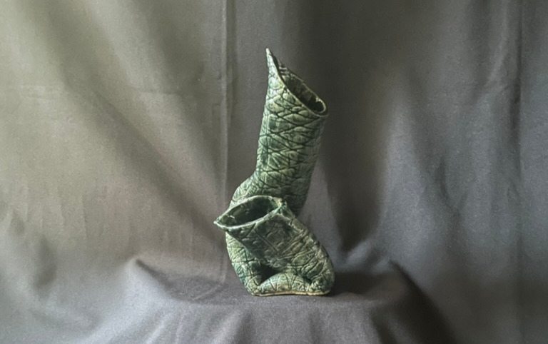 Counterpoint, a sculpted pottery Ikebana vessel